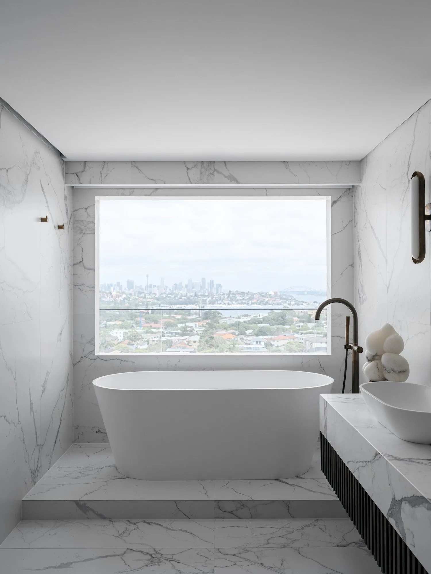 Bath tub with water views in background